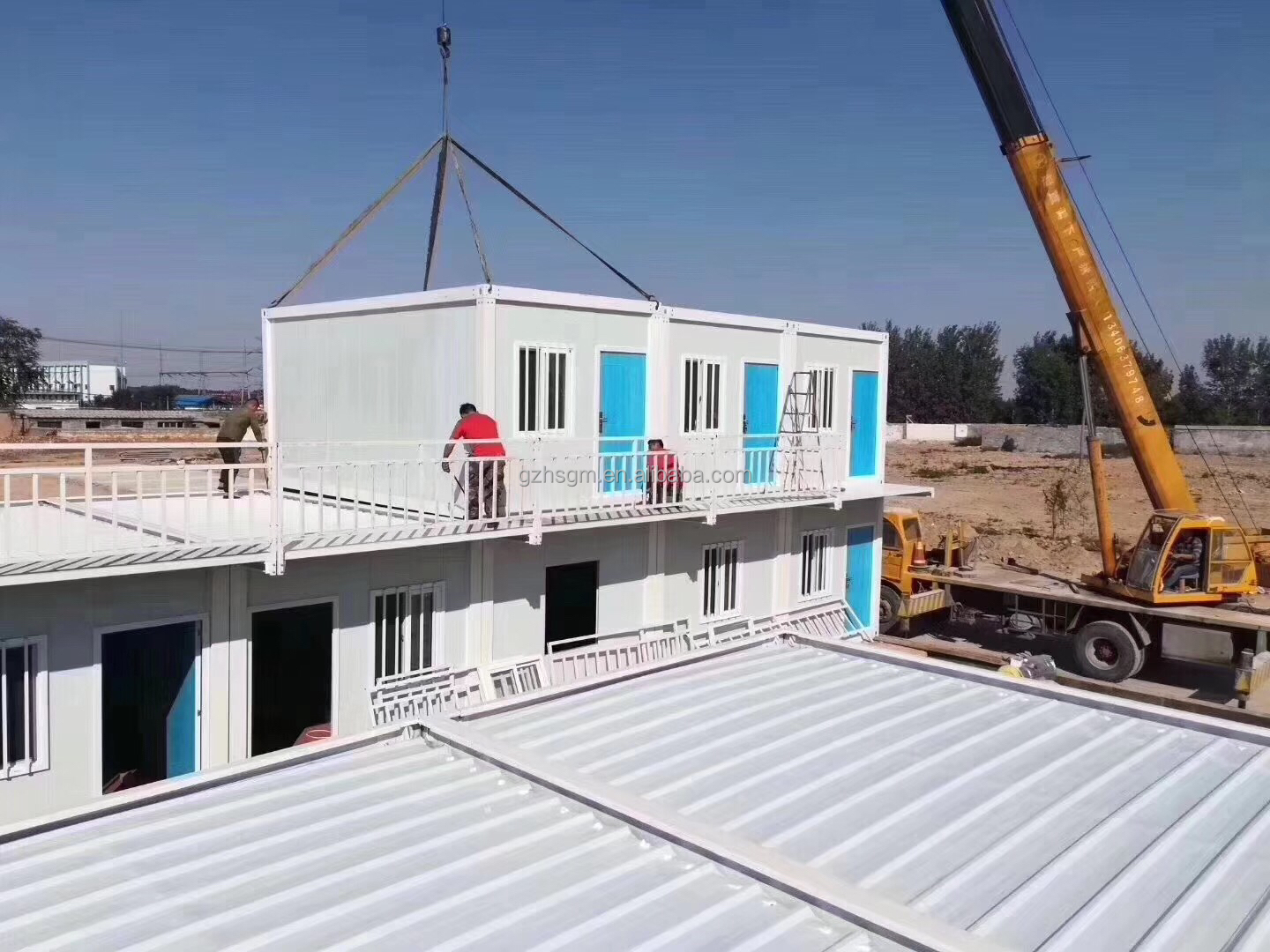 Casa contenedor a precios de fábrica, casa prefabricada Modular de doble dormitorio ensamblada rápidamente, casa de aislamiento temporal hecha a medida